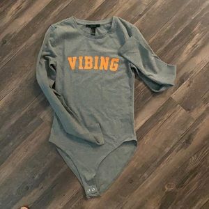Never been worn Forever 21 “Vibing” Bodysuit